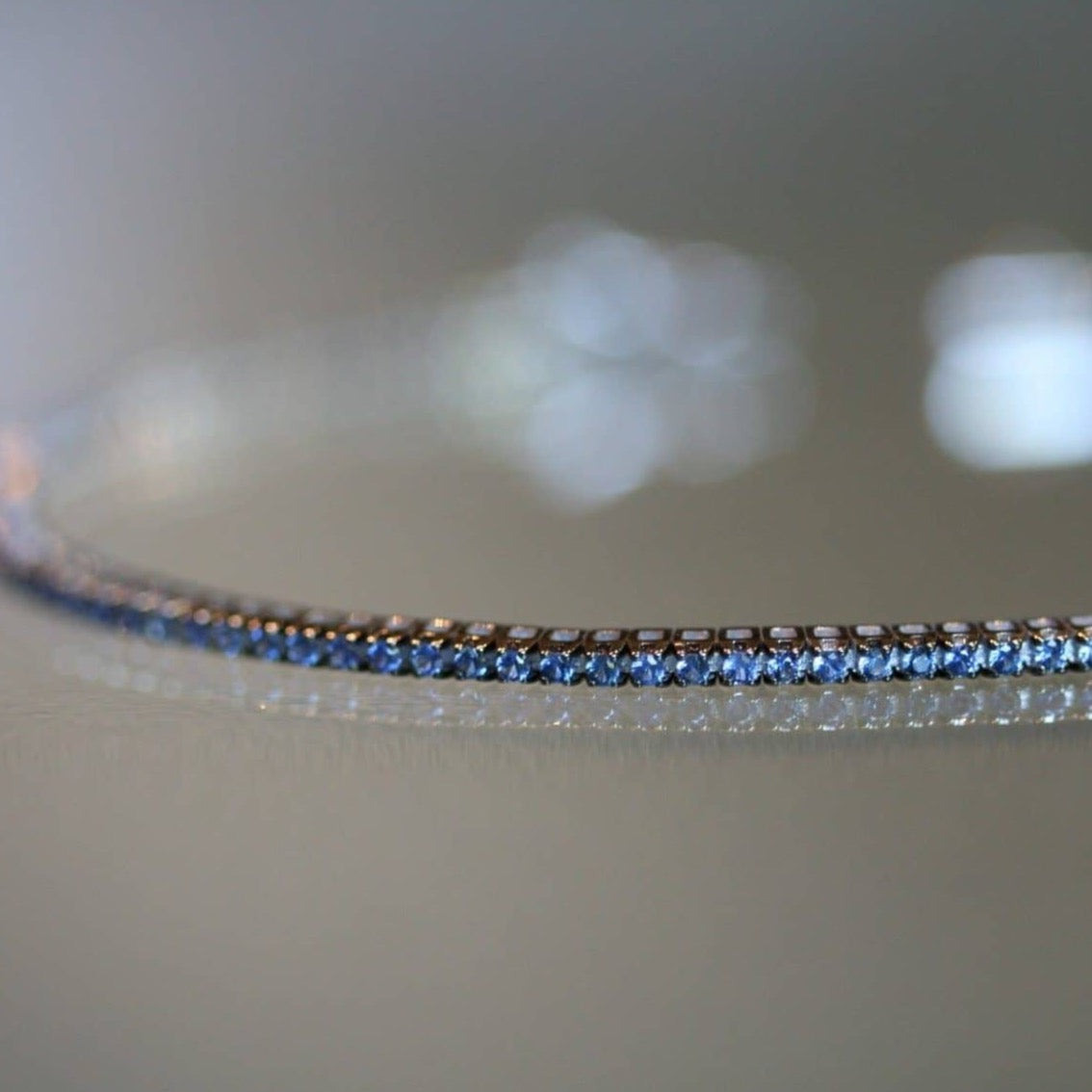blue sapphire 0.6 ct skinny tennis bracelet 18ct gold