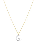 Diamond initial necklace (G) in 9ct white or yellow gold.